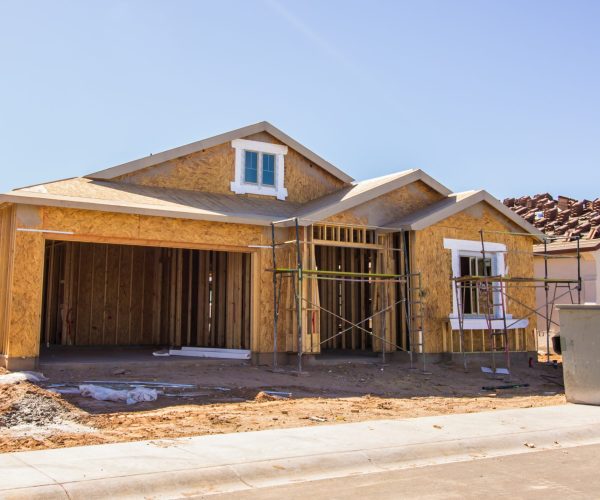 New,Home,Construction,In,Housing,Development